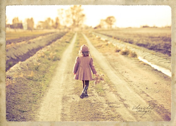 Vintage Girl Walking on Path