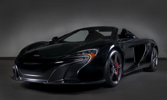 McLaren 650s on a digital background in the dealership.
