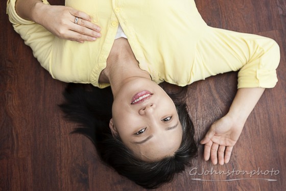 Laying on the floor.