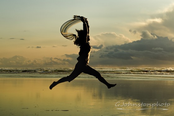 Leaping at the beach.