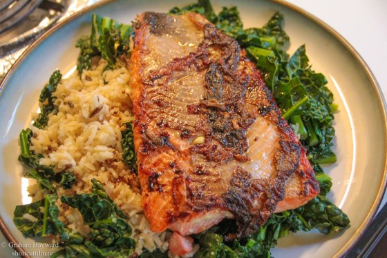 Wild caught Salmon with wild rice on a bed of Tuscan kale
